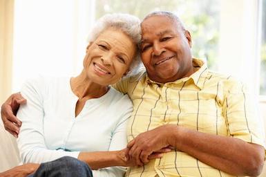 Image of older couple hugging